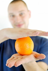 Image showing man with orange