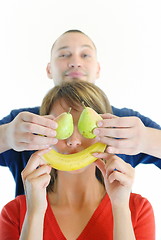 Image showing happy and healthy couple with fruits