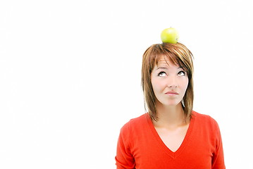 Image showing pretty girl with apple on head