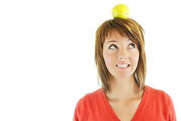 Image showing pretty girl with apple on head
