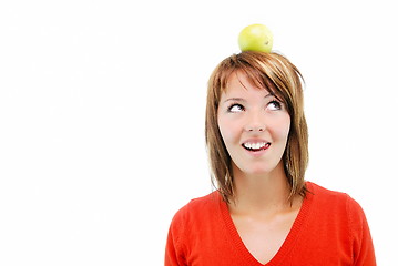 Image showing pretty girl with apple on head