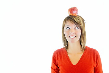 Image showing pretty girl with apple on head