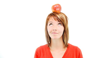 Image showing pretty girl with apple on head