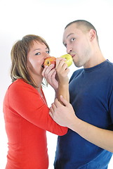 Image showing happy couple eating apples