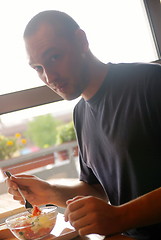 Image showing man eating healthy food it an restaurant