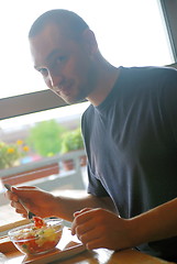 Image showing man eating healthy food it an restaurant