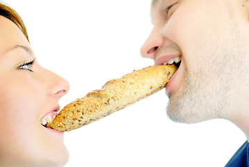 Image showing happy couple eating croissant