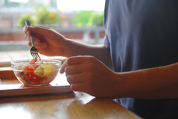 Image showing man eating healthy food it an restaurant