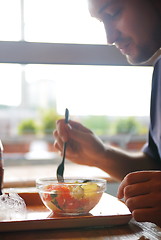 Image showing man eating healthy food it an restaurant