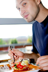 Image showing man eating healthy food it an restaurant
