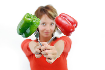 Image showing pretty girl with pepper isolated