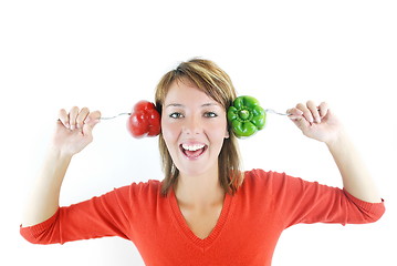 Image showing pretty girl with pepper isolated