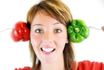 Image showing pretty girl with pepper isolated