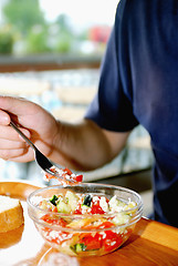 Image showing man eating healthy food it an restaurant