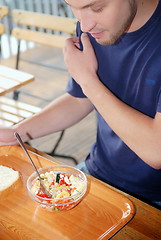 Image showing man eating healthy food it an restaurant