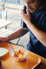 Image showing man eating healthy food it an restaurant