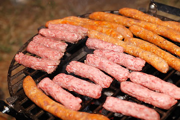 Image showing sausages on grill