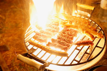 Image showing sausages on grill