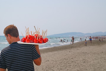 Image showing apples on stick