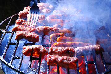 Image showing sausages on grill