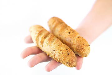 Image showing isolated croissant in hand