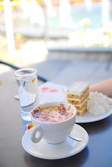 Image showing cake and coffee on table