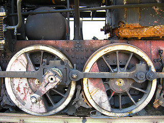 Image showing Huge wheels of a steam locomotive