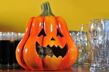 Image showing helloween party pumpkin and wine glasses close up