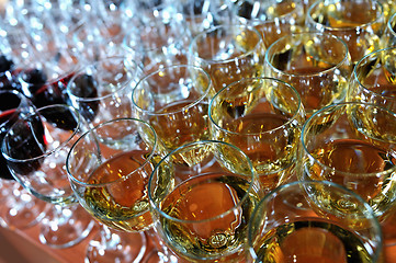 Image showing red wine glasses backgound party