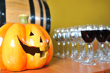 Image showing helloween party pumpkin and wine glasses close up