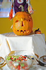 Image showing helloween party pumpkin and wine glasses close up