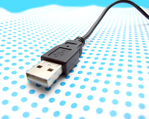 Image showing usb cable on dotted background