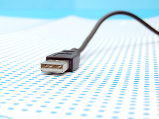 Image showing usb cable on dotted background