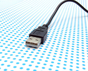 Image showing usb cable on dotted background