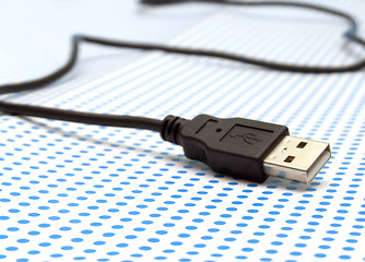 Image showing usb cable on dotted background