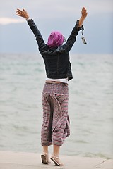 Image showing beautiful young woman on beach with scarf