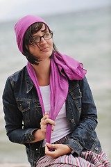 Image showing beautiful young woman on beach with scarf