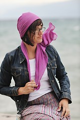 Image showing beautiful young woman on beach with scarf