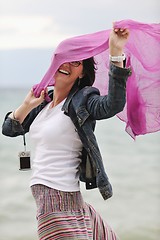 Image showing beautiful young woman on beach with scarf