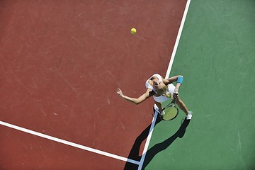 Image showing young woman play tennis outdoor