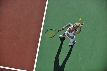 Image showing young woman play tennis outdoor