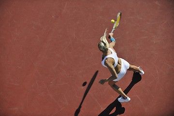 Image showing young woman play tennis outdoor