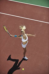 Image showing young woman play tennis outdoor