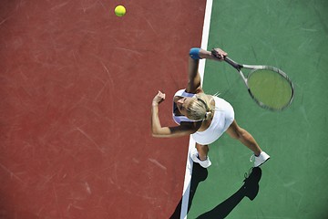 Image showing young woman play tennis outdoor