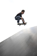 Image showing Boy practicing skate in a skate park