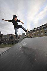 Image showing Boy practicing skate in a skate park