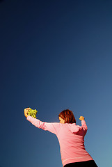 Image showing girl with grape outdoor