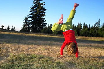 Image showing Girl doing exercise in nature
