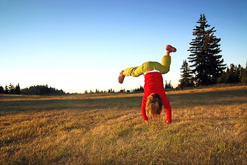 Image showing Girl doing exercise in nature