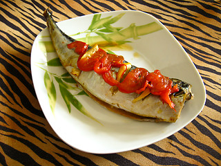 Image showing Dish with a stewed fish and tomatoes